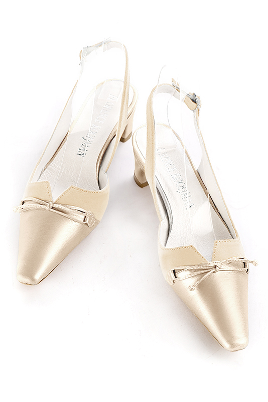 Gold and champagne white women's open back shoes, with a knot. Tapered toe. Low kitten heels. Top view - Florence KOOIJMAN